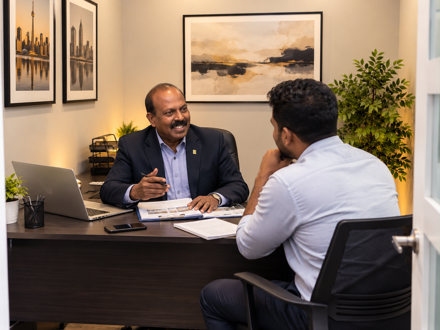 Karu Kandiah leading an executive real estate coaching session in a Toronto boardroom
